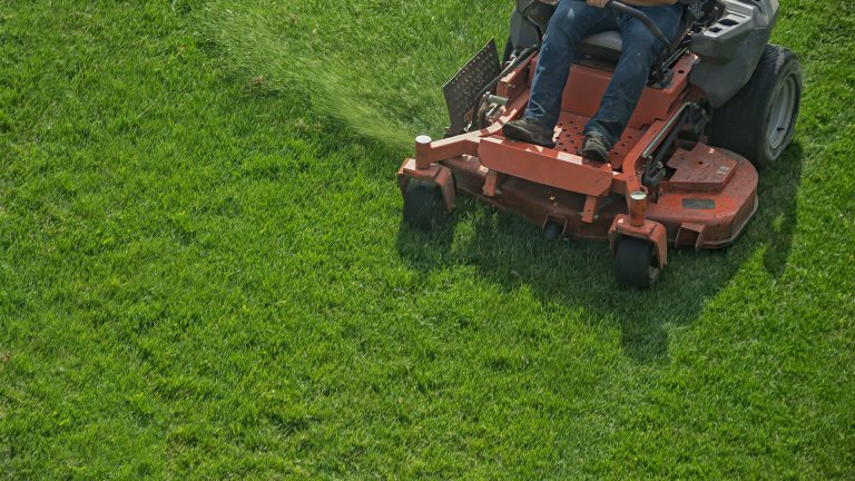 Gardner on lawnmower