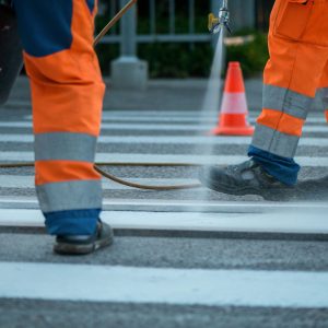 Image of a contractor on a sidewalk