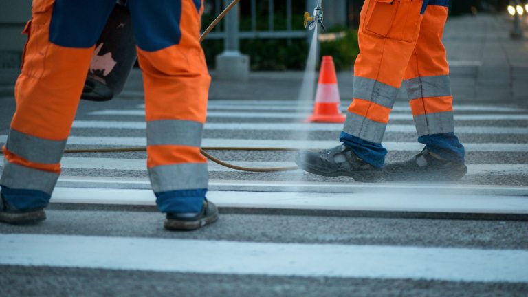 Image of a contractor on a sidewalk