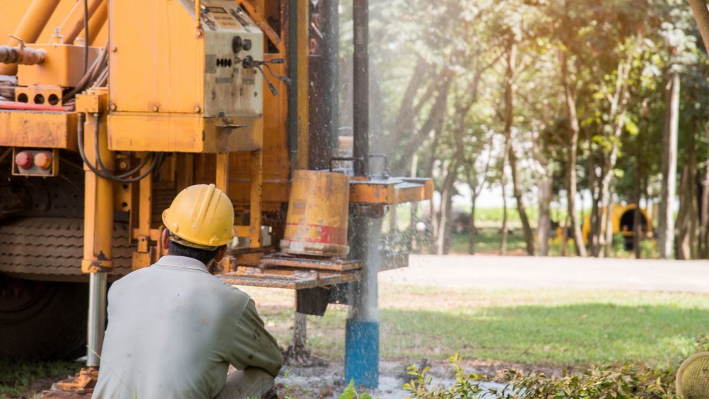 Image of man drilling