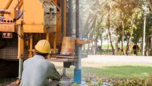 Image of man drilling